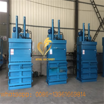 Vertical paper compacting baler