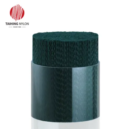 Polypropylene fill materials for spiral wound roller brushes