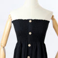 Strapless black pleated dress