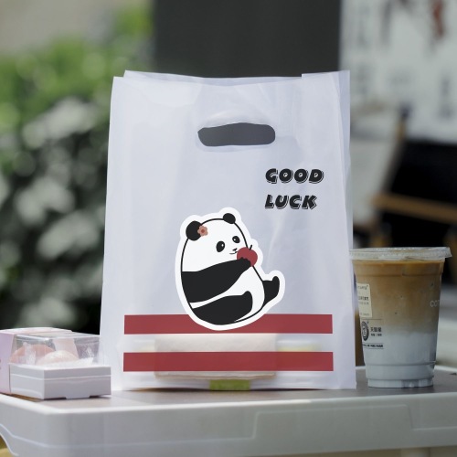 Sac d'emballage de gâteau tenu dans la main en plastique de panda de dessin animé mignon