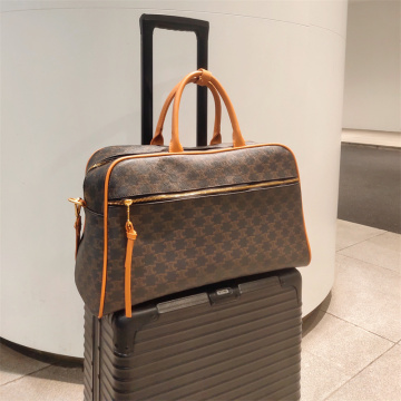 女性向けのシンプルな茶色の高級旅行ダッフルバッグ