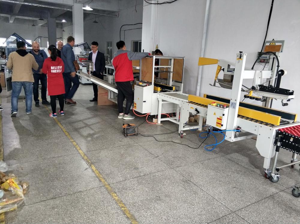 Dyehome automatic sealing and strapping machine