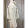 Giacca con zip in shearling bianco sporco