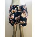 Vintage bloemenprint heren strandshorts