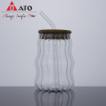 Water glass tumbler with bamboo lid and straw