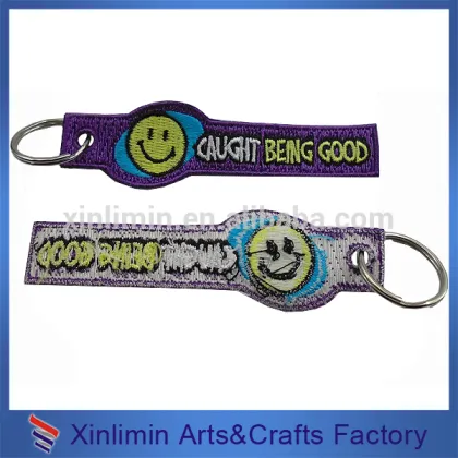 Factory wholesale newest design 100% pvc tag embroidered brand patches