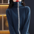 Woolen knit pullover with hem and pile neck