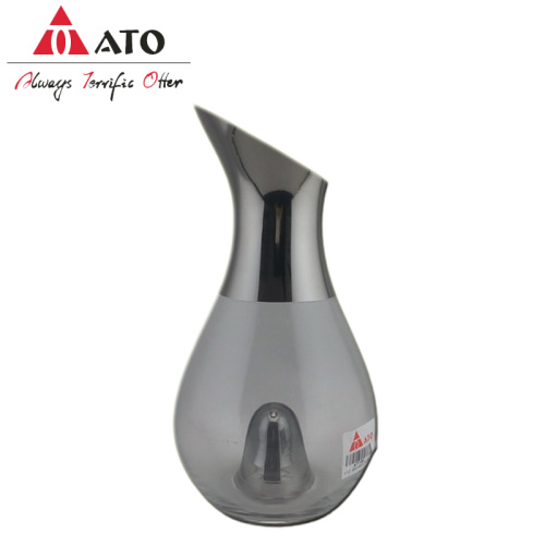 Clear decanter with slanted top with aluminum kettle