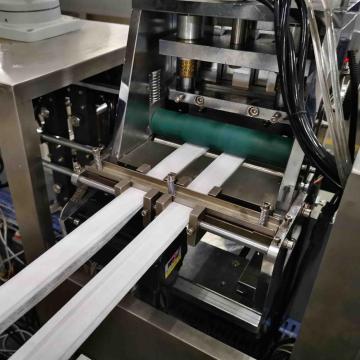 Machine de fabrication de lingettes humides automatique