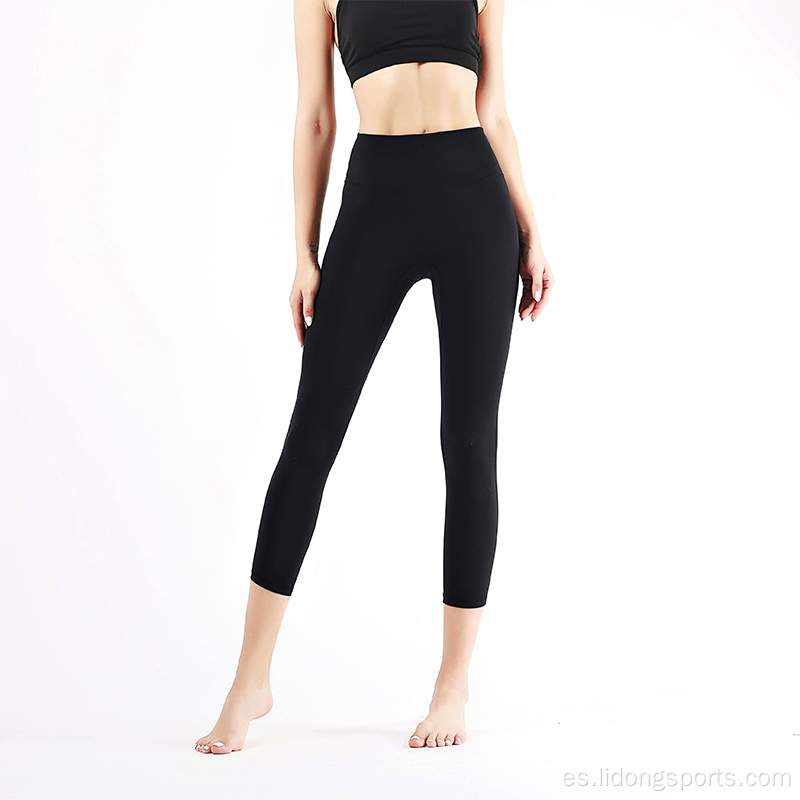 Venta caliente Leggings de pantalones de yoga para mujeres de alta calidad