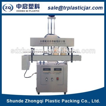 Pet cans filling aluminum foil lid sealing machine price