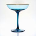 blue wine glass set with gold rim