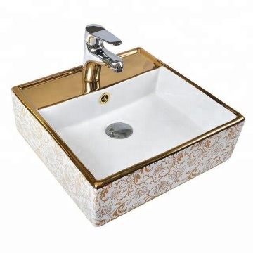 Réseaux de salle de bain dorés avec trou du robinet - bassin de lavage en or en céramique carré en Arabie saoudite