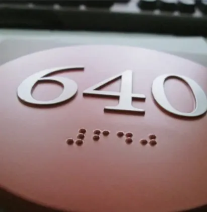 Braille under ADA auditorium number