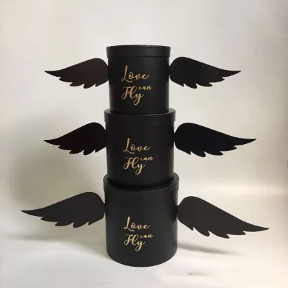Round flower box with angel's wings