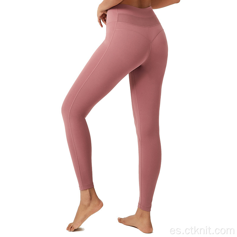 top corto con leggings de cintura alta