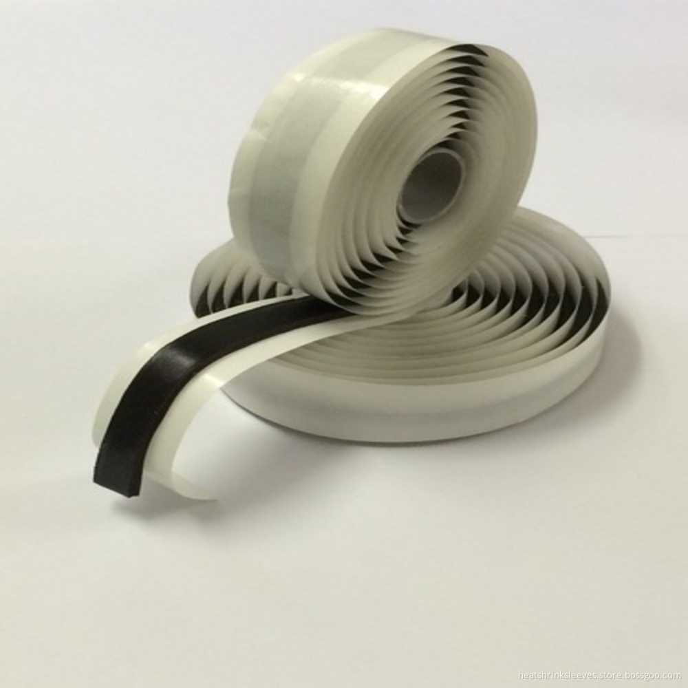 Close-up of rubber mastic tape application on pipeline joint