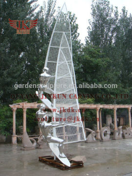 stainless steel surfing statue