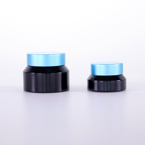 Blue aluminum lid black sloping shoulder cream jar