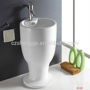 132 Porcelain round shape free standing one piece ceramic basin and ceramic sink