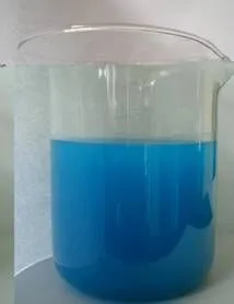 Blue Liquid clarifier in swimming pool