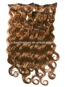 Superior quality wavy blond clip in human hair extensions