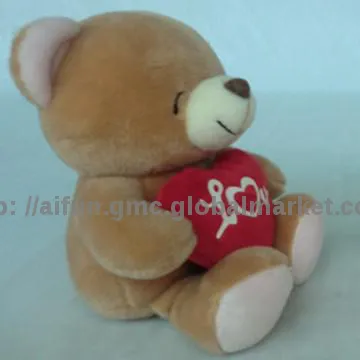 Toy Bear hugging love heart, the Valentine toy for the lovers