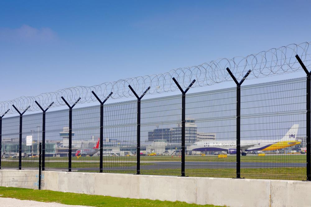 Steel picket fence airport west