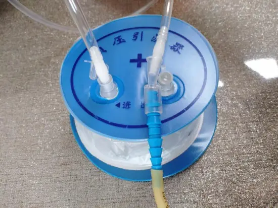 Medical grade wound drainage with luer lock connector