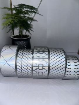 Hot-melt adhesive film with engraved patterns