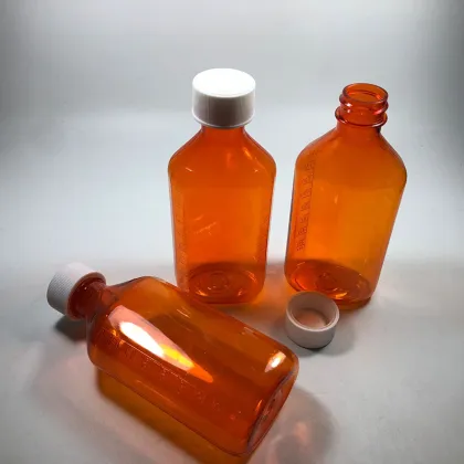 Wholesale PET Plastic Cough Syrup Bottles: 2oz & 4oz Oval Medicine Containers for Pharmacy Use