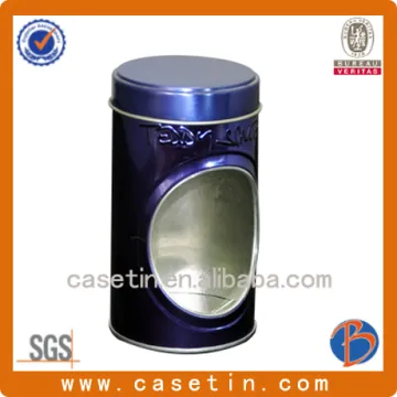 Round metal tea box with window
