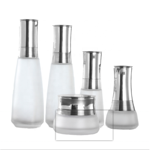 Milchglas kosmetische Flasche und Glas