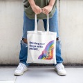 Flag-Raising Spectrum Pride Day Celebration Tote Bag