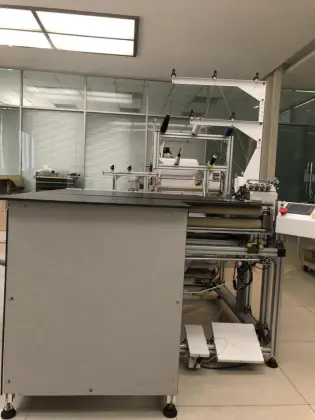 Automatic sewing machine for bed skirt