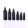 Black round shoulder bottle with tamper evident dropper