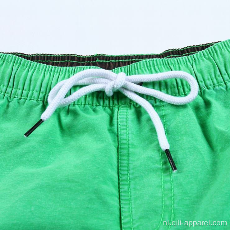 Groene sneldrogende atletische heren shorts zwemkleding short