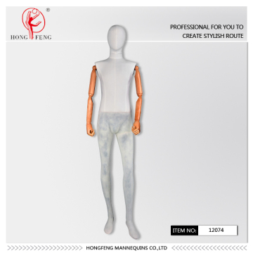 white cloth mannequin with translucent pants and wooden