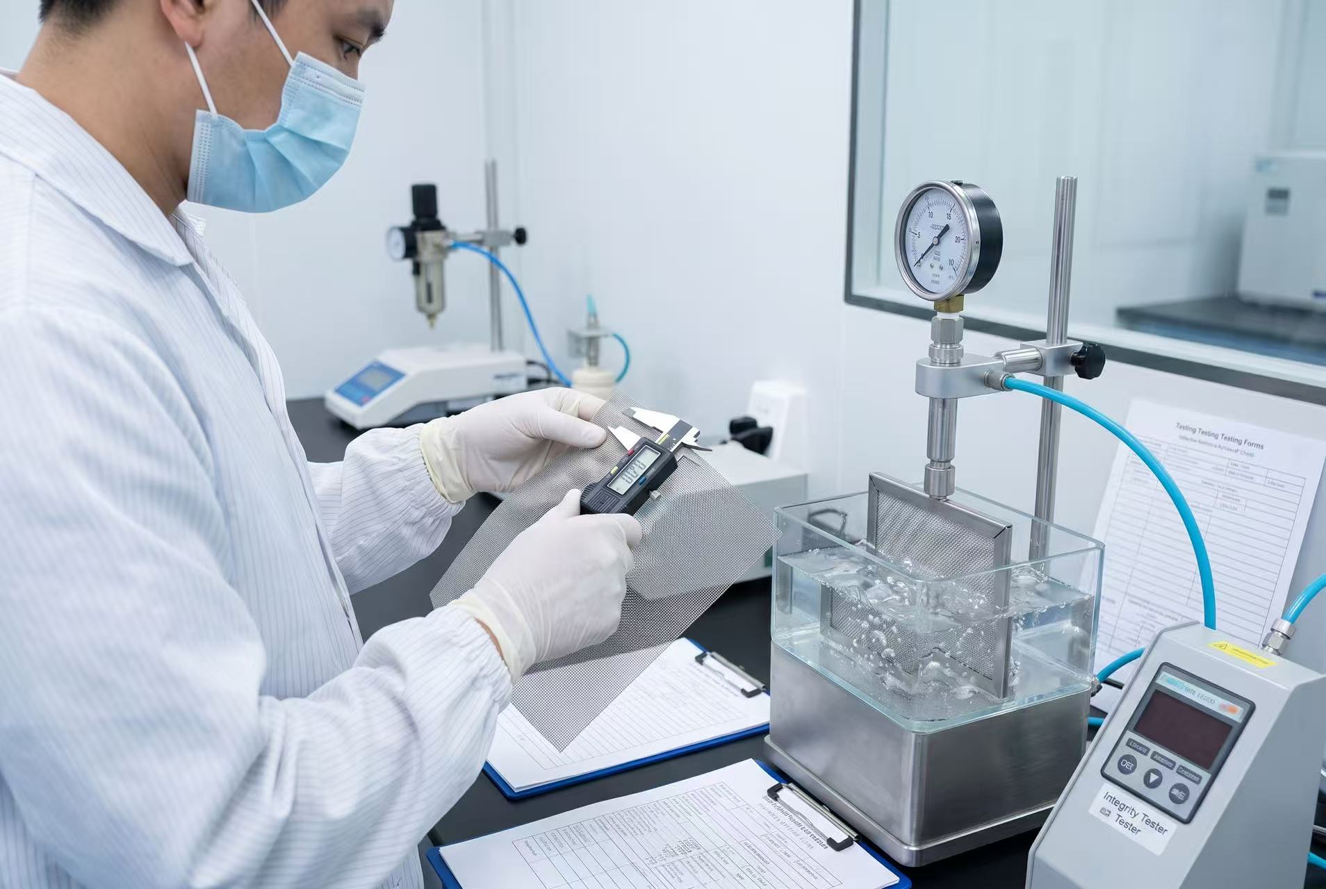 ANJIA Group quality control inspection of stainless steel filter mesh with bubble point testing and wire diameter measurement