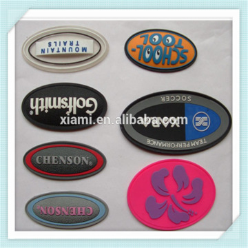 whosesale environmental friendly embossed stripe soft pvc rubber bag label