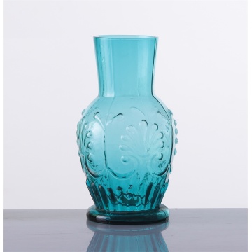 Handgefertigte blaue Wasserglasflasche mit einzigartigem Design