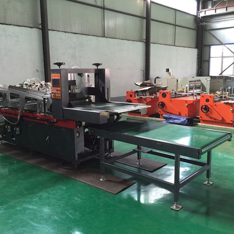 Automatic paperboard partition assemble machine