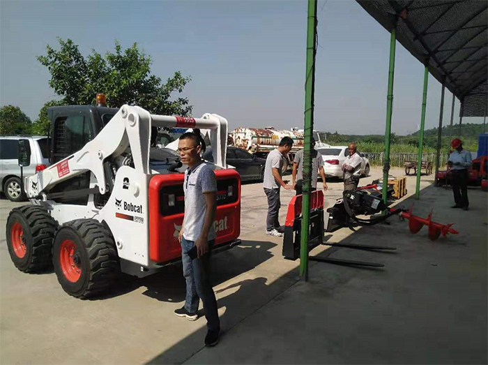 Bobcat S770 with multiple attachments