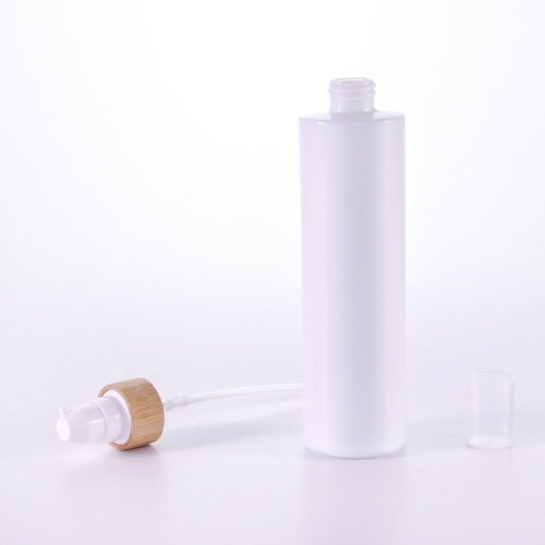 White glass lotion bottle with bamboo lid