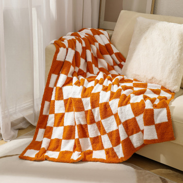 Plaid -Samtdecke mit Strick -Schachbrettdesign