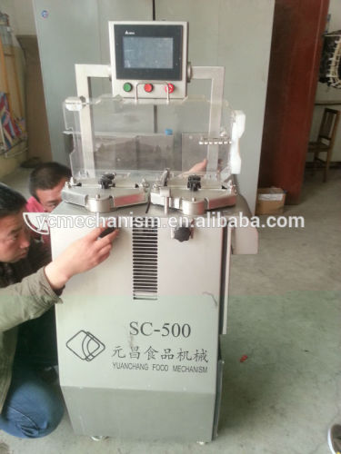 Sausage cutting knot machine