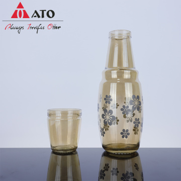 Amber glass bottles with flower design glass cup