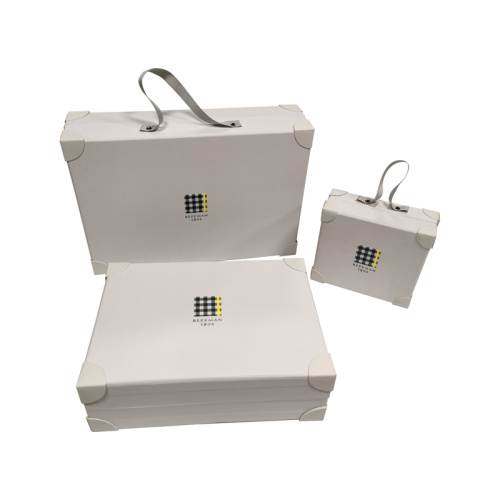 Advent calendar suitcase gift box with ribbon handle
