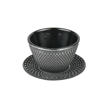 Cast iron tea cups and saucers