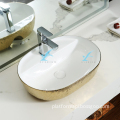 High-End Luxury: Golden-Rounded Plated White Cover One-Piece Wall-Mounted Toilet Bowl with Printed Design and Solid Ceramic Hand